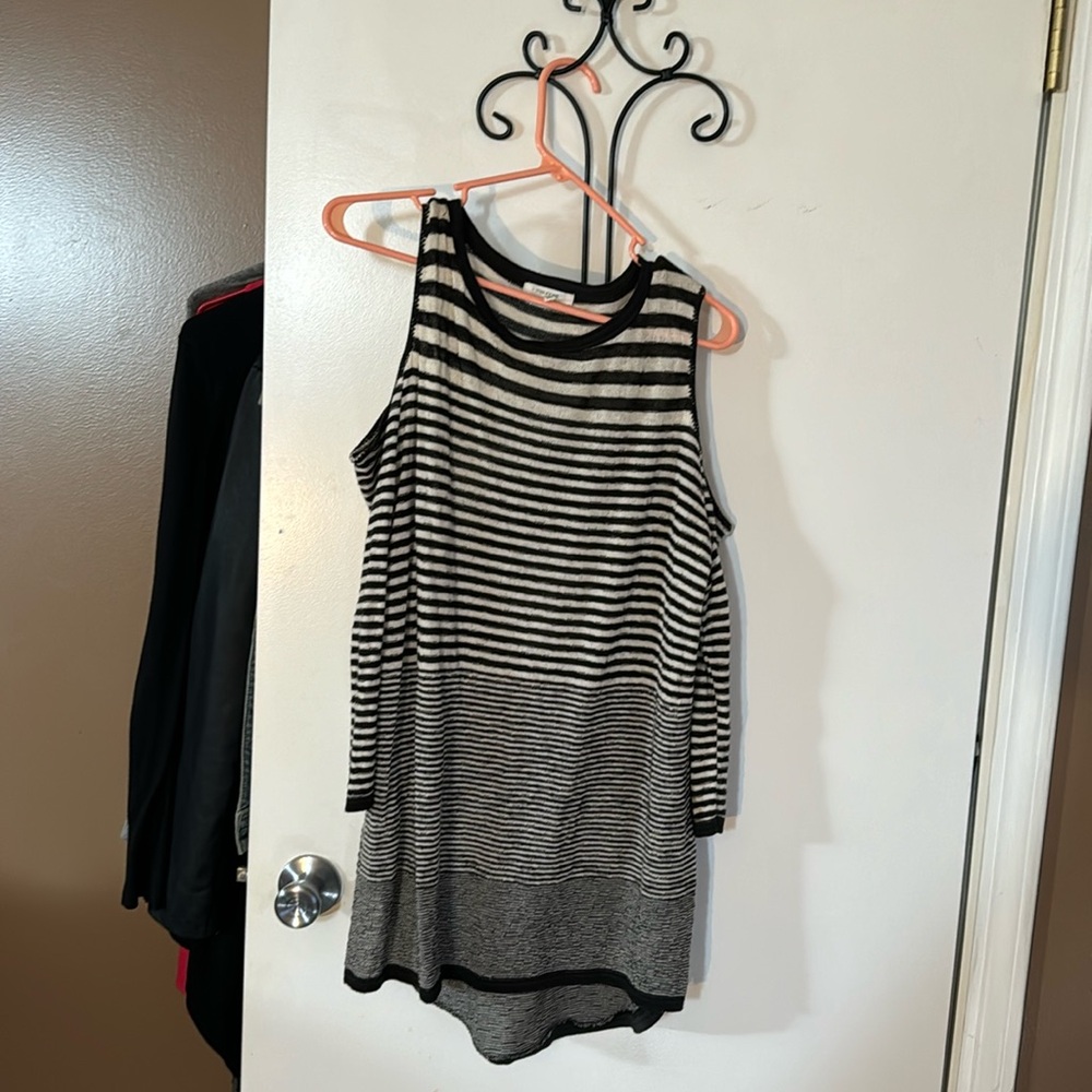 Black striped cold shoulder sweater.